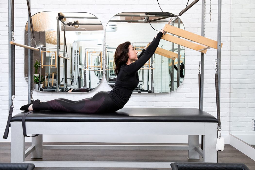 Equipment: Classic Cadillac – Exercise: Swan on Push-through Bar