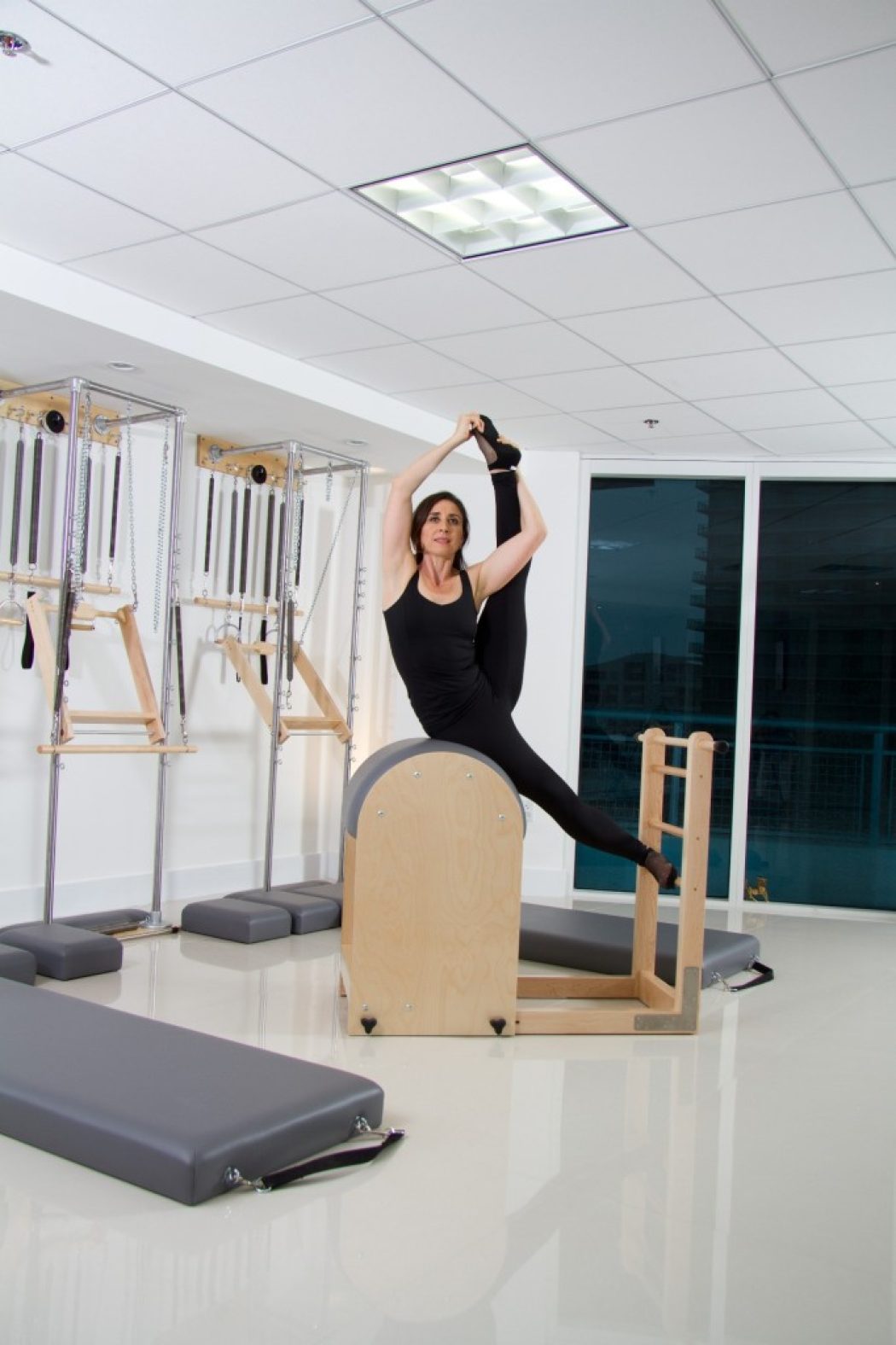 Equipment: Ladder Barrel – Exercise: Side Sit Up Series