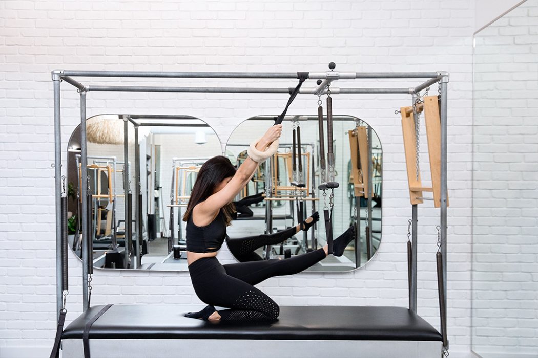 Equipment: Classic Cadillac – Exercise: Kneeling Ballet Stretches